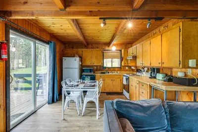 a kitchen with a table and chairs in a room at Groveland Vacation Rental about 24 Mi to Yosemite! in Groveland