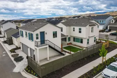 an aerial view of a white house at California Midterm Rental with Fenced Yard! in Tracy
