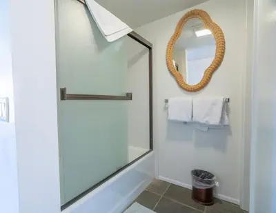 a bathroom with a shower and a mirror at Rr-interlaken 25 in June Lake