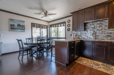 a kitchen and dining room with a table and chairs at Rr-edgewater16 in June Lake