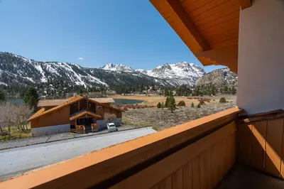 a view from the balcony of a house with mountains at Rr-interlaken 17 in June Lake