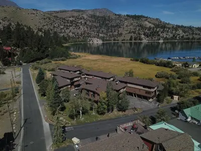 an aerial view of a town with a lake and houses at Rr-edgewater20 in June Lake