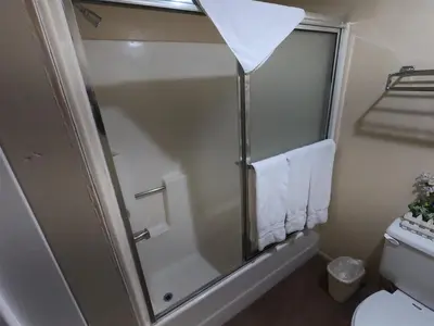 a bathroom with a shower with a white towel at Rr-edgewater13 in June Lake