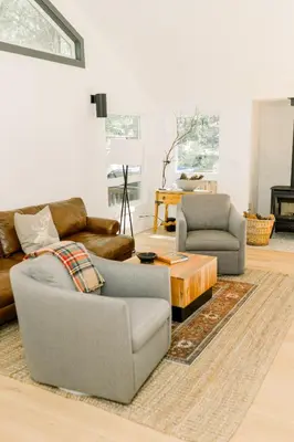 a living room with two chairs and a couch and a table at Casita- Lake Area Winter Special Ends 51626 in Bass Lake