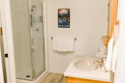 a bathroom with a sink and a shower at Moreno-Lake Area Free Night Special in Bass Lake