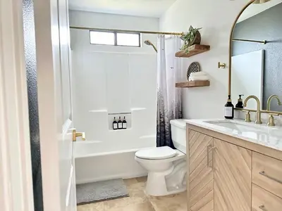 a bathroom with a toilet and a sink and a shower at Prime location Yosemite Expedition by Casa Oso in Oakhurst