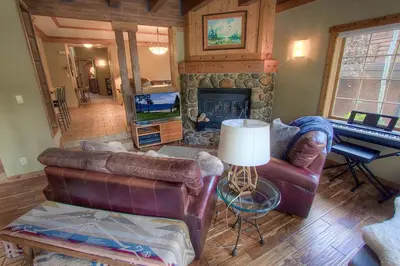 a living room with a couch and a fireplace at Third Creek Comfort townhouse in Incline Village