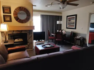 a living room with a couch and a fireplace at GetAways at the Lodge at Kingsbury Crossing in Stateline