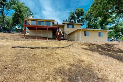 a house sitting on top of a hill at Walling Mountain Retreat in Groveland