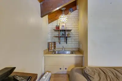 a kitchen with a sink in a room at Pinecrest Dodge Ridge Cabin Shared Outdoor Space in Cold Springs