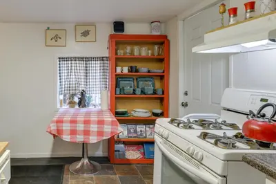 a kitchen with a stove and a stove top oven at Dodge Ridge Pinecrest Mountain Cabin Near Hiking! in Cold Springs