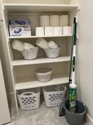 a shelf with toothbrushes and toiletries in a bathroom at Brand-New, Beautiful & Stylish Home in Sacramento! in Sacramento