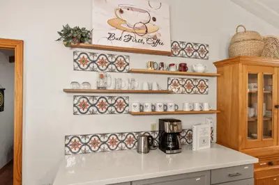 a kitchen with a coffee maker on a counter at Sierra Mountain Escape - Brand new spa/game room in Oakhurst