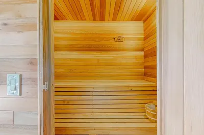 a wooden sauna with a wooden wall at Granite Tranquility in Yosemite West