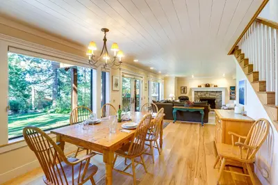 a dining room with a table and chairs at 2 Mi to Lake Tahoe Spacious and Serene Retreat! in Tahoe City