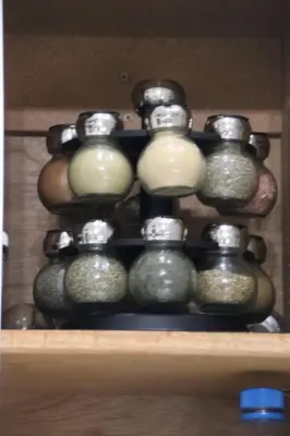 a group of glass bottles sitting on a shelf at Casa Mariposa - A Foothill Retreat near Yosemite in Mariposa