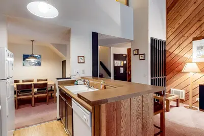 a kitchen with a sink and a counter top at Crestview 70 in Mammoth Lakes