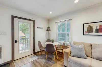 a living room with a couch and a table at Manzanita Holiday in South Lake Tahoe