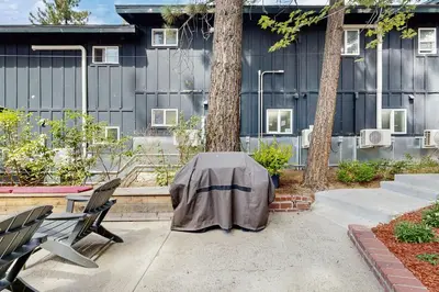 a table with a coat on it in a patio at Manzanita Holiday in South Lake Tahoe