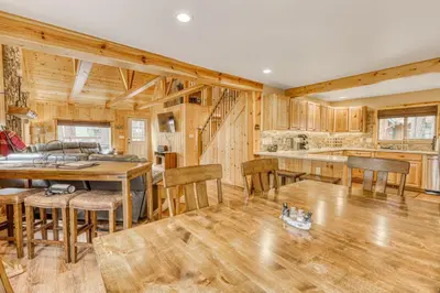 a kitchen and dining room with a table and chairs at Black Bear Hideaway in South Lake Tahoe