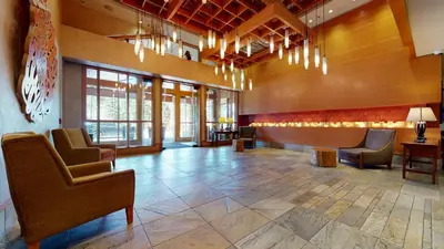 a lobby with chairs and a waiting room at Village Monache #720 condo in Mammoth Lakes