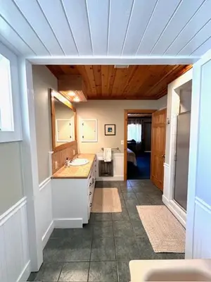 a bathroom with a sink and a mirror at O'Connell-Lake Area Free Night Special in Bass Lake