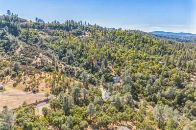 an aerial view of a mountain with trees at Newly Renovated Retreat on 6 Acres, Discover Murphys Lodge with Scenic Views! in Murphys