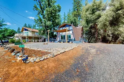 a house on the side of a road at Cozy Cabin in Groveland