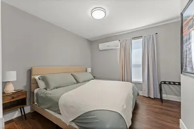 a small bedroom with a bed and a window at Tranquil Retreat: Cozy 2Bed, 1Bath Oasis in Fallon in Fallon