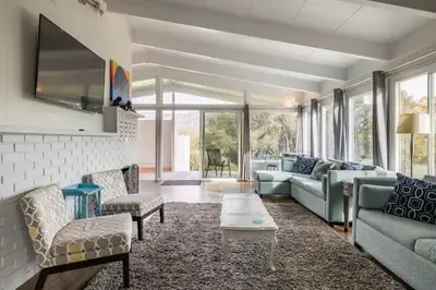 a living room with a couch and chairs and a tv at Black Bear Suite Hot Tub Sleeps 4 affordable in Oakhurst