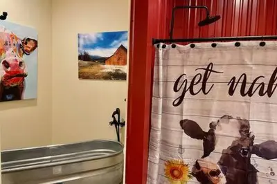 a shower curtain with the words get wild on it at Crazy Cow Private HOT TUB BBQ Sleeps 2 in Ahwahnee