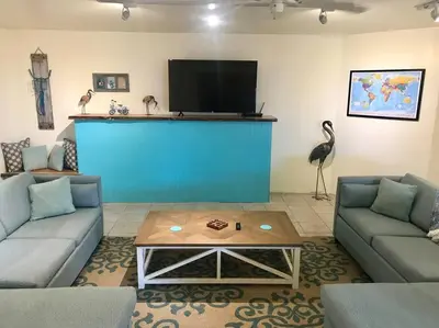 a living room with two couches and a tv at Crane Suite Hot Tub Bbq King Bed- Sleeps 4 in Ahwahnee