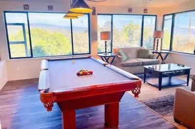 a living room with a pool table in it at Deer Haven Hot Tub Foosball Pool Table in Ahwahnee