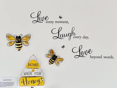 a group of butterflies on a wall with words at Honeybee Hive HOT TUB BBQ 8 minutes to Bass Lake Sleeps up to 6 in North Fork