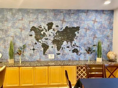 a mural of a map of the world on a wall at Peacock Suite Hot Tub Sleeps up to 4 Bbq in Ahwahnee