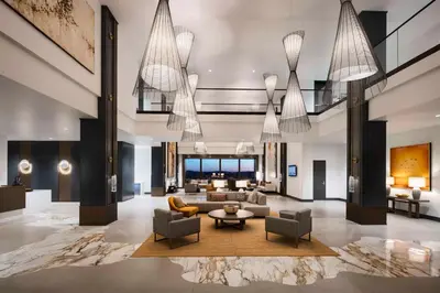 a lobby of a hotel with a couch and chairs at Red Hawk Resort & Casino in Placerville