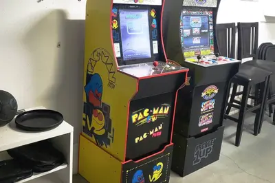 two arcade video game machines in a room at **Kaweah River House** - 1/2 Mile to Sequoia Park in Three Rivers