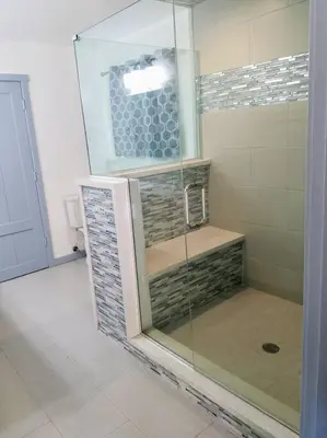 a bathroom with a shower with a glass door at Sequoia River House, close to SNP, 2 Decks on Amazing River on 7acres in Three Rivers