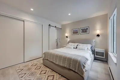 a bedroom with a large bed and a window at Luxury Tahoe Getaway in Incline Village in Incline Village