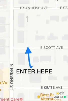 a screenshot of a cell phone screen with an arrow pointing to an enter lane at Fresno Vacation Rental 106 in Fresno