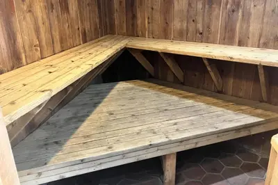 a wooden bench inside of a wooden wall at Sierra Park Villas 39 H in Mammoth Lakes