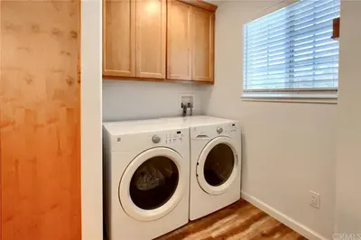 a white washer and dryer in a room at Brookside Cottage in Mariposa