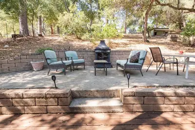 a group of chairs sitting around a fire pit at Murphys Wine Country Getaway in Murphys