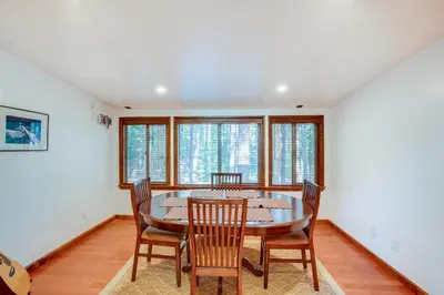 a dining room with a table and chairs at Hike, Boat and Ski South Lake Tahoe Home in South Lake Tahoe