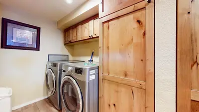 a laundry room with a washer and dryer at Bridges #108 condo in Mammoth Lakes