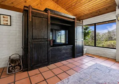 an old wooden door in a room with windows at Scenic Spanish Rancho - Breathtaking Views in Three Rivers
