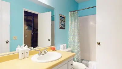 a bathroom with a sink and a shower at La Residence V #T05 condo in Mammoth Lakes