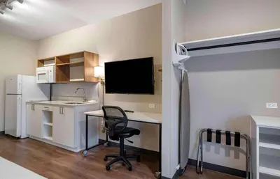 a kitchen with a desk and a chair in a room at Extended Stay America Premier Suites - Reno - Sparks in Sparks