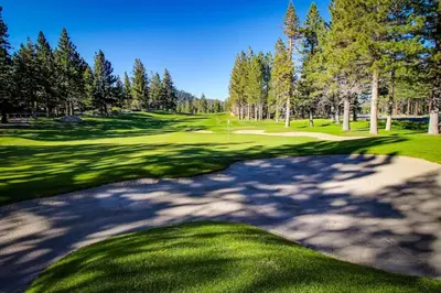 a view of a golf course with a green at Meadow Ridge 34 in Mammoth Lakes
