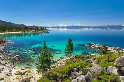 a view of crater lake from the shore at Tahoe Snowbird Retreat in Stateline